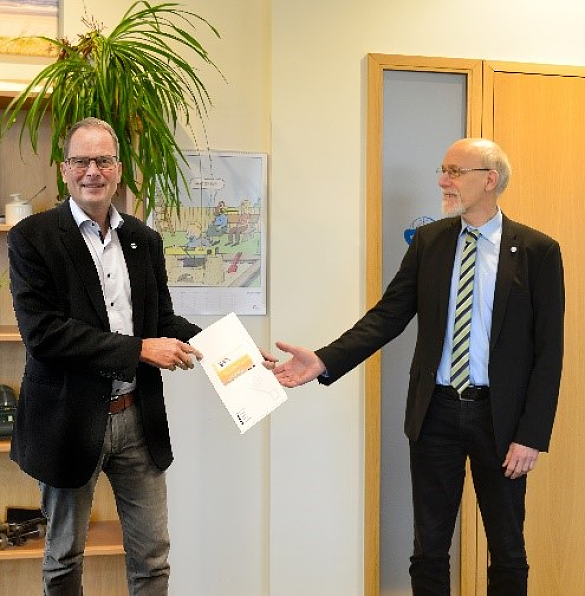 Ulrich Gellhaus (Leiter GeoInformation Bremen) und Rolf-Werner Welzel (Geschäftsführer Landesbetrieb Geoinformation und Vermessung Hamburg) – Fotomontage GeoInformation Bremen